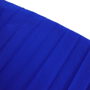 Close-up of vibrant royal blue pleated fabric texture and vertical fold details