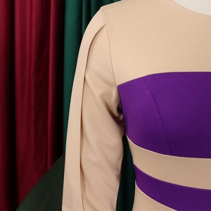 Detailed view of the purple and khaki color-block dress with unique pleated shoulder design