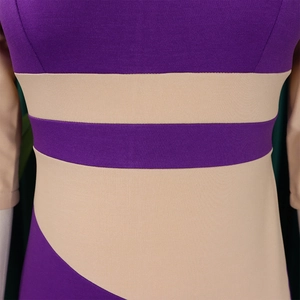 Detailed close-up of purple and beige color block patchwork on a knit bodycon dress