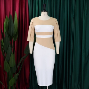 Detail view of the beige and white patchwork design on the mid-sleeve bodycon dress