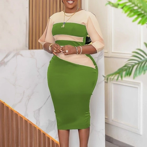 Detail of green bodycon dress with nude geometric panels and split cuff sleeve design