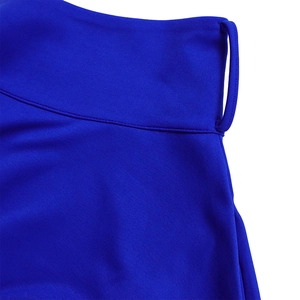 Detail of the high-waisted royal blue skirt with belt loops and knit fabric texture