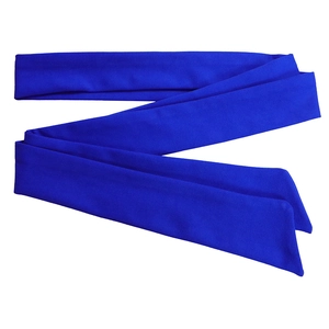 Close-up of a wide royal blue elastic headband showing detailed knitted texture and fabric
