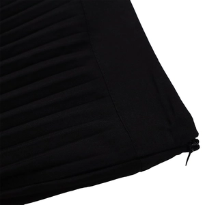 Detailed side view of high-waist pleated pants showing concealed zipper and accordion folds