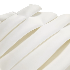 Detail of elegant white pleated chiffon fabric showing neat parallel folds and texture