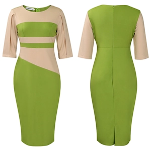 Detail view of plus size bodycon dress featuring lime green and beige color block design