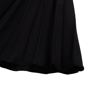 Close-up of pleated texture and professional hem finish on black wide leg trousers