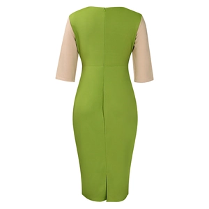 Detailed back view of a slim pencil dress with green and beige color-block and back slit