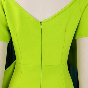 Detail eines neongrünen Partykleides mit V-Ausschnitt hinten und verdecktem Reißverschluss