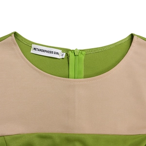 Detail shot of round neckline with green invisible zipper and brand size label