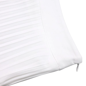 Close-up of white pleated fabric detail with high-quality invisible zipper closure