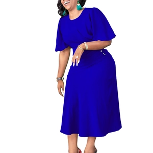 Detail of royal blue dress with flared sleeves and white bead waist embellishments