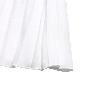 Detail shot of the crisp pleated hem and stitching on a white high-quality woven fabric