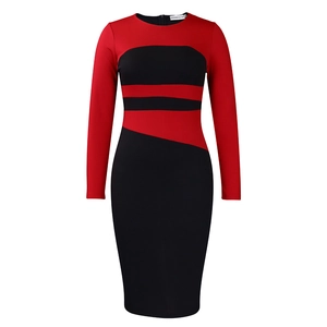 Dettaglio dell'abito a tubino bicolore rosso e nero con silhouette slim-fit elegante