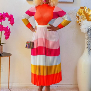 Detailed view of the colorful pleated skirt with vibrant stripes and knit texture