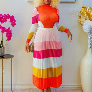 Detail view of colorful horizontal striped knit set with pleated long skirt and top