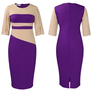 Detail of color-block dress showing bodycon fit, back zipper, and hem split design