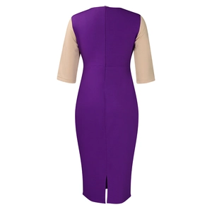 Detail of fitted midi dress featuring a back zipper closure and a slit hem for ease