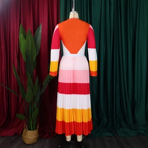 Detail of colorful accordion pleat texture and contrasting stripes on the back of the dress