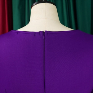 Close-up of elegant purple dress back showing invisible zipper and fine stitching details