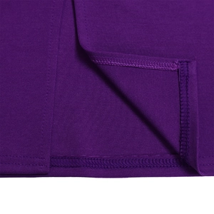 Detail of reinforced hem stitching and purple ribbed knit fabric texture on the dress
