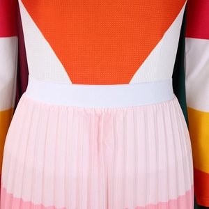 Detailed close-up showing orange mesh, white ribbed knit, and pink pleated chiffon fabric