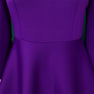 Detailed view of the waist stitching and fine texture on this elegant purple African dress