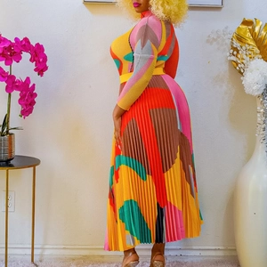 Detailed view of color-block pleated midi skirt set featuring vibrant geometric patterns