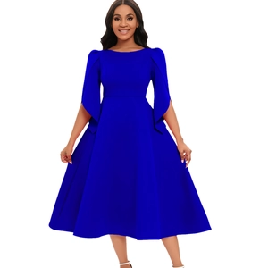 Detail view of the elegant royal blue dress with unique split flare sleeves and wide hem