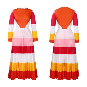 Detail view of colorful pleated dress showing vibrant color-block design and elastic waist
