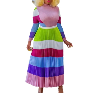 Detail of colorful pleated skirt set with vibrant striped patterns and knit texture