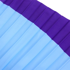 Macro shot of high-quality pleated fabric detail featuring purple and light blue contrast