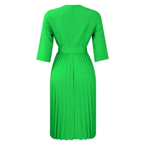 Detail view of the pleated green dress back featuring a high waist and hidden zipper