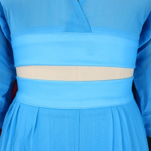Detail of sky blue chiffon set showing double waistband and pleated texture on trousers