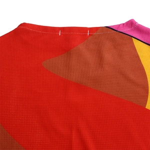 Macro detail of high-quality pleated neckline with geometric color block patterns