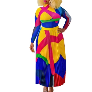 Detail view of colorful geometric print and pleated texture on the long sleeve set