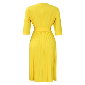 Detail of elegant yellow pleated dress featuring a V-neckline and back invisible zipper