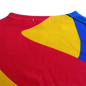 Macro shot of geometric color-block pattern and breathable mesh fabric with twin-needle stitching