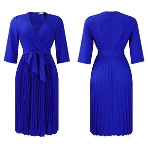 Detail of royal blue pleated V-neck dress featuring a wrap waist and elegant mid-sleeves