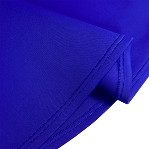 Macro shot of royal blue knit fabric showing precise double-needle stitching on the hem
