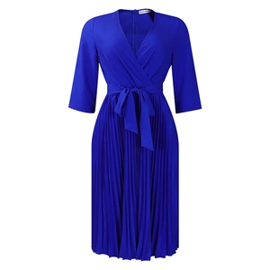Detail view of the elegant royal blue pleated dress featuring a V-neck and tied waistline