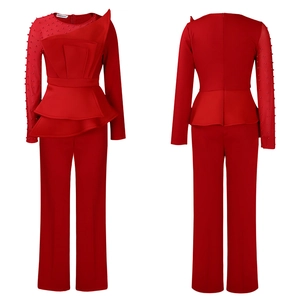 Front and back view of red two-piece jumpsuit with mesh panel and pearl beading