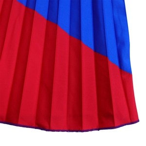 Detail of red and blue pleated skirt fabric with fine stitching and silky texture