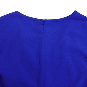 Detail of royal blue dress back with seamless invisible zipper and fine pleated texture