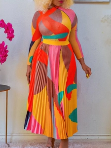 Women's pleated skirt set with vibrant colorful geometric patterns and long sleeves