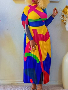 Chic geometric color-block pleated outfit with high-neck long sleeve top and midi skirt