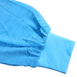 Detail view of vibrant blue pleated chiffon sleeve with fine texture and smooth cuff design