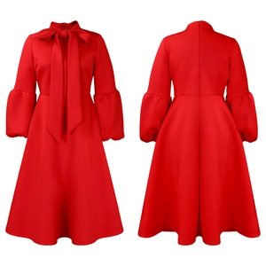Front and back view of red midi dress with lantern sleeves and large bow neckline