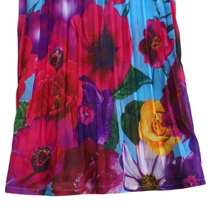 Macro shot of vibrant floral print and fine accordion pleats on lightweight chiffon fabric