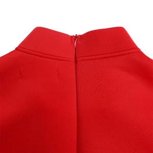 Detail view of the red dress back collar showing the high neck and invisible zipper